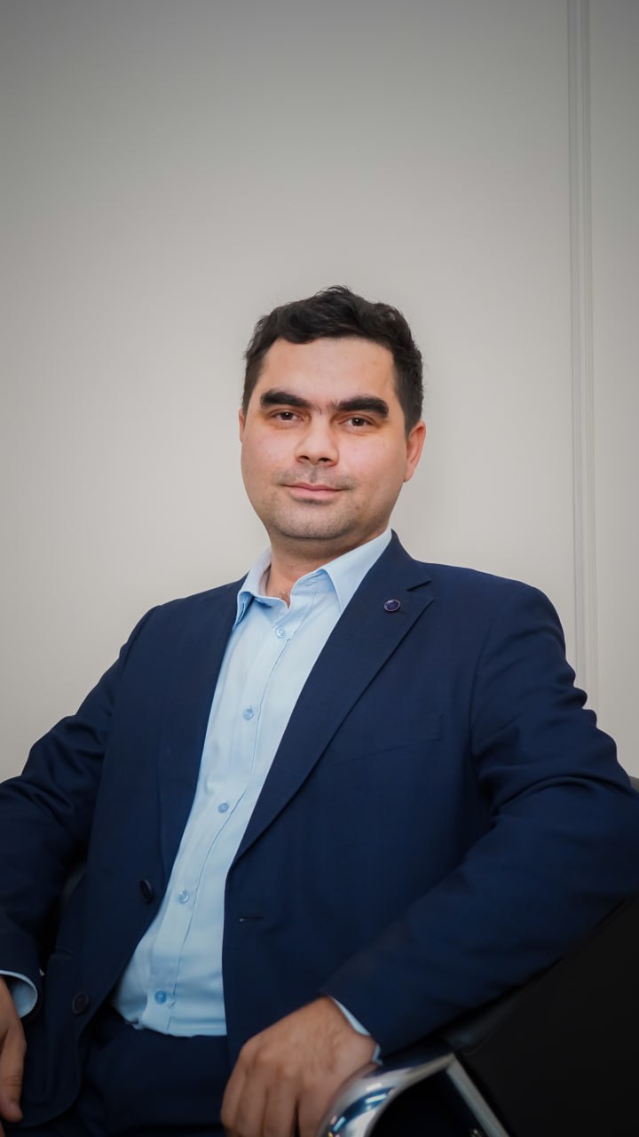 Photographer holding camera